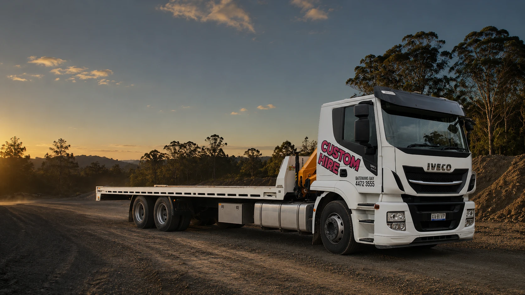 WIDE PHOTO: TILT TRAY OR TIPPER TRUCK ON THE ROAD